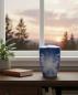 Preview: Deep blue pet urn with sky motif and staircase. A comforting symbol of goodbye and hope for your beloved darling. This dignified piece is the perfect tribute – secure yours today.